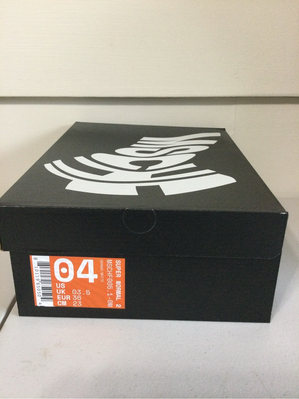 MSCHF Black Shoe Box with White Graphic and Orange Size Label